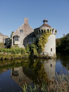 a castle with a moat around it