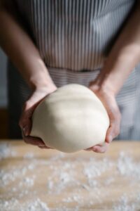 Close-up of Person Making Dough