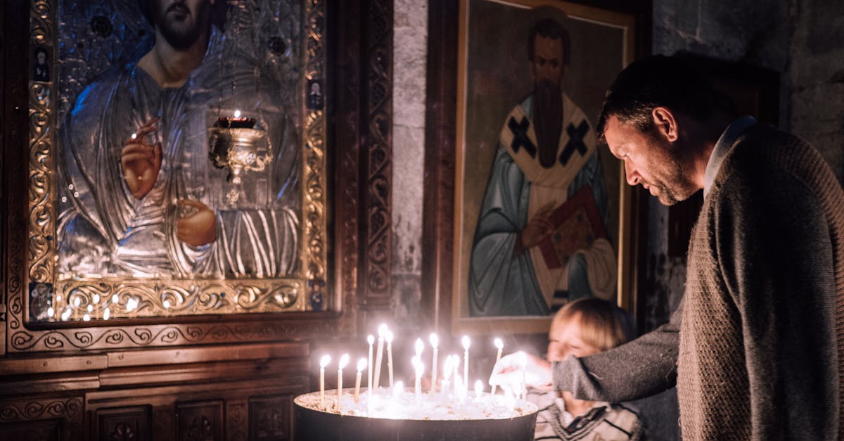 Father and Son Lighting Candles