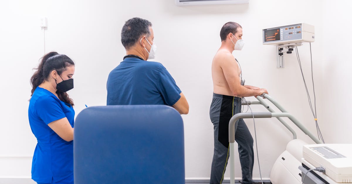 A Cardiologist Examining a Patient Undergoing Cardiac Stress Test