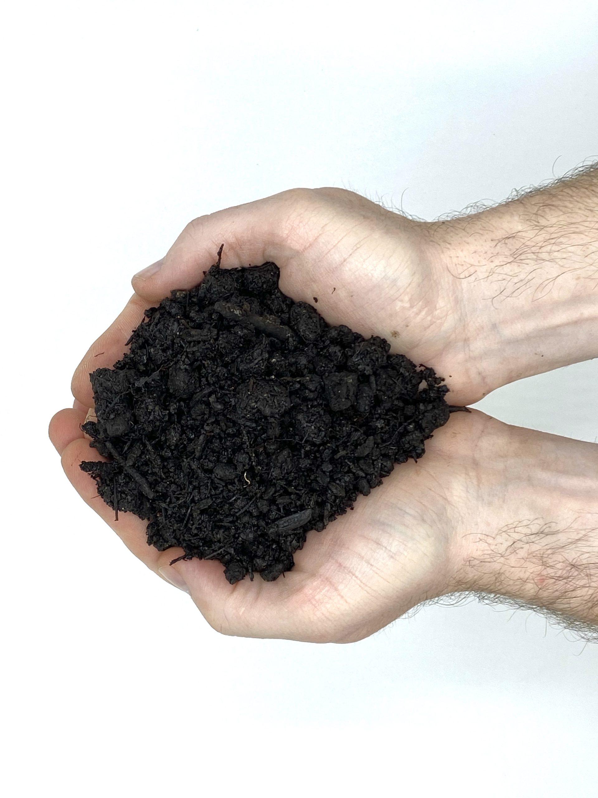 Compost and soil pH, dirt in hands