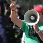 protest Protester pointing finger and holding megaphone government censorship stock pictures, royalty-free photos & images