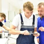 Group of young people in technical vocational training with teacher Group of young people in technical vocational training with teacher vocational training stock pictures, royalty-free photos & images