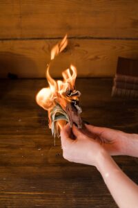 Burning cash symbolizing financial waste.